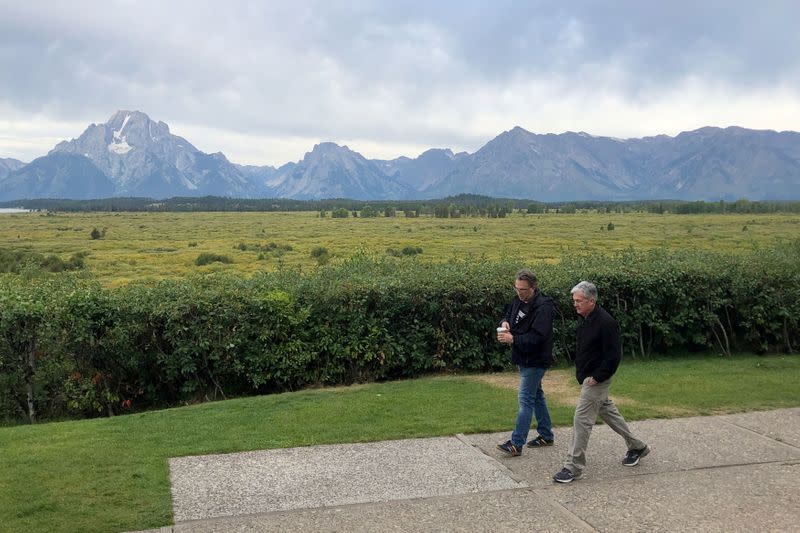 FILE PHOTO: Federal Reserve Chair Jerome Powell and New York Federal Reserve President John Williams walk together in Jackson Hole