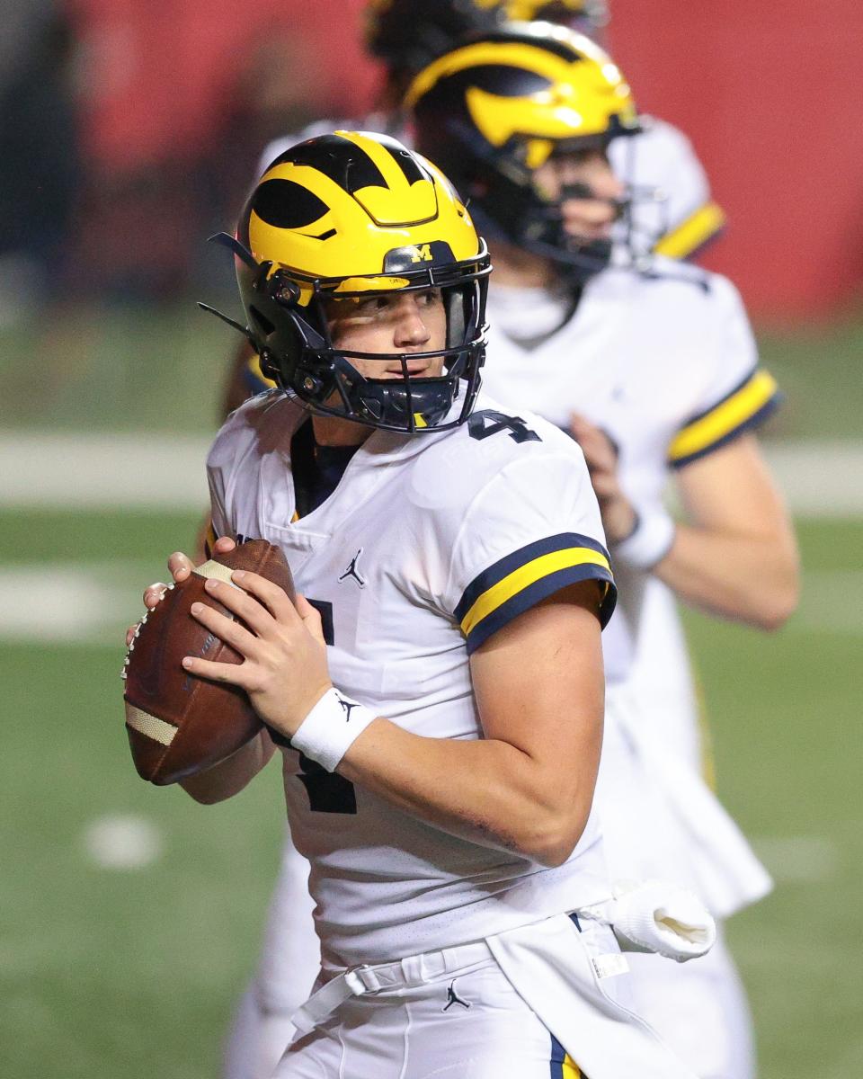 Michigan Wolverines backup quarterback Dan Villari (4) warms up before his game against the Rutgers Scarlet Knights at SHI Stadium on Saturday, Nov. 21, 2020.