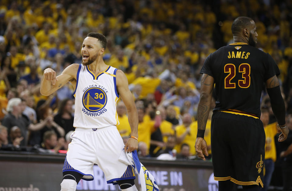 Stephen Curry, left, at the 2017 NBA Finals. (MediaNews Group/Bay Area News via Getty Images)