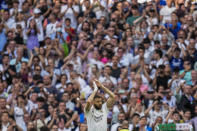 Real Madrid's Karim Benzema claps to supporters during the Spanish La Liga soccer match against Athletic Bilbao at the Santiago Bernabeu stadium in Madrid, Sunday, June 4, 2023. (AP Photo/Bernat Armangue)