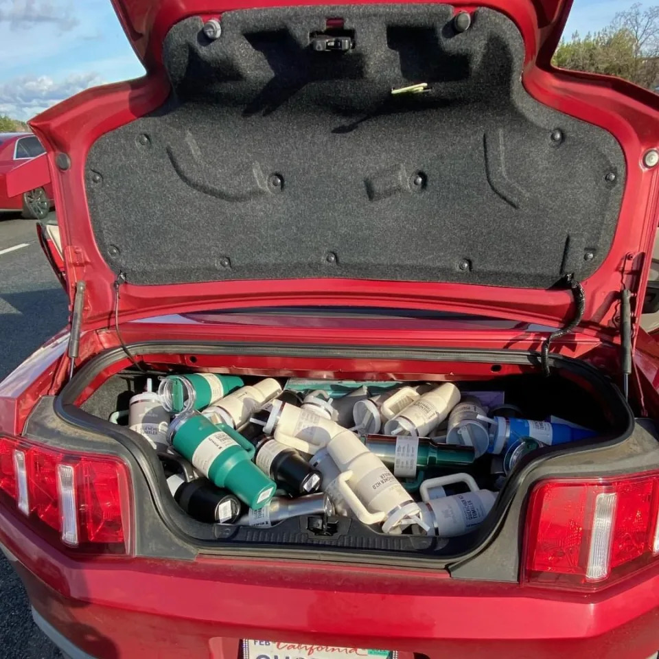 Staff saw a woman take a shopping cart full of Stanley water bottles without paying for them.