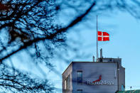 The Danish flag is seen on half mast above the radio station Radio24syvm, after the former leader of the gang Los Guerreros in Denmark and employee of the radio, Nedim Yasar, was shot dead on Monday night on Hejrevej in Copenhagen, Denmark November 20, 2018. Bax Lindhardt/Ritzau Scanpix/via REUTERS