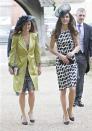 <p>Just two months after her own big day, the Duchess attended the wedding of friends Sam Waley-Cohen and Annabel Ballin with sister Pippa in tow. The royal wore an understated look for the occasion so not to overshadow the bride: a monochrome shift dress from Zara paired with a black hat. <em>(Photo: PA)</em> </p>