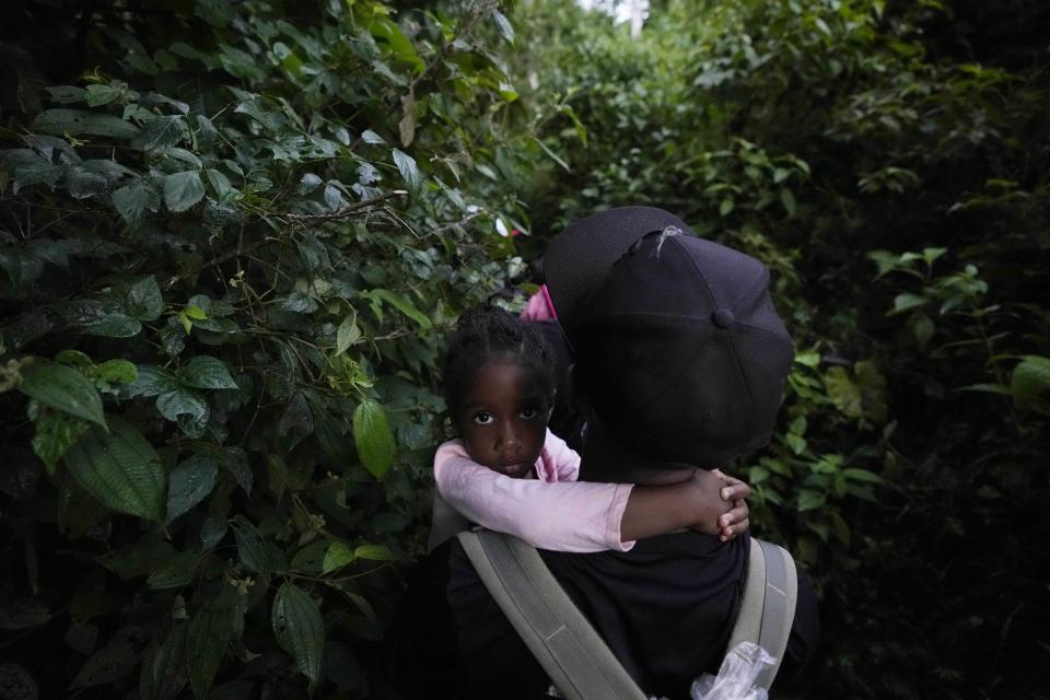 Migrants continue on their trek north, near Acandi, Colombia, Wednesday, Sept. 15, 2021. (AP Photo/Fernando Vergara)