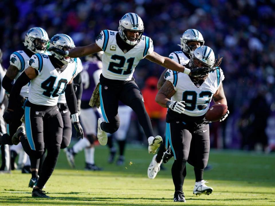 Carolina Panthers defensive tackle Bravvion Roy (93) and teammate safety Jeremy Chinn (21) celebrate an interception in the first half of an NFL football game against the Baltimore Ravens Sunday, Nov. 20, 2022, in Baltimore. (AP Photo/Patrick Semansky) Patrick Semansky/AP