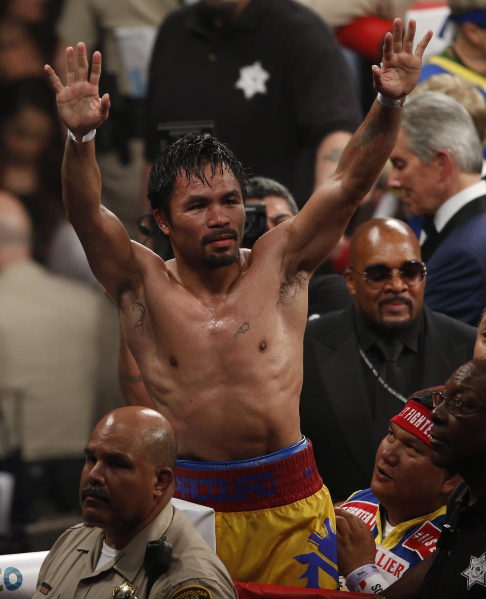 Manny Pacquiao, from the Philippines, greets fans after his welterweight title against Floyd Mayweather Jr., on Saturday, May 2, 2015 in Las Vegas. (AP Photo/Eric Jamison)