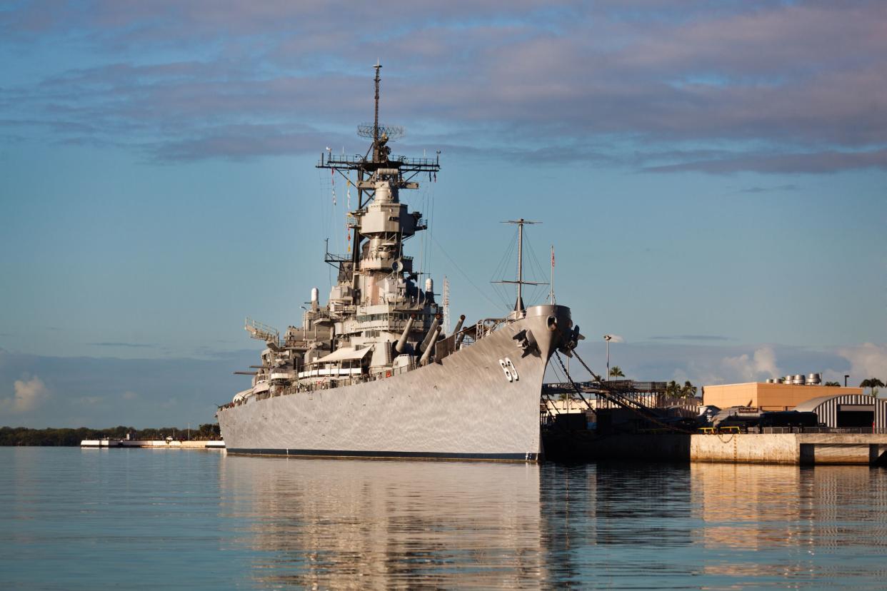 Honolulu Oahu, Hawaii, USA - Jan 10, 2015: The battleship U.S.S. Missouri moored in Pearl Harbor naval base, the headquarters of the United States Pacific Fleet. Also a popular tourist destination on the island of Oahu.