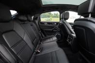 <p>Porsche lowered the Cayenne coupe's rear-seat cushions a bit to buy back some of the headroom stolen by the vehicle's lower roofline.</p>