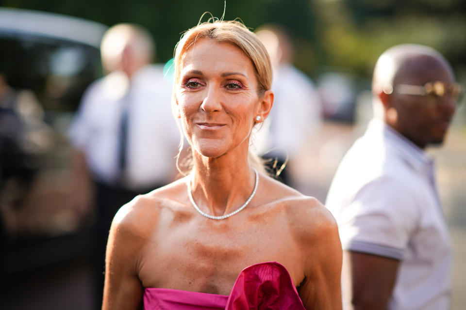 PARIS, FRANCE - JUNE 29: Celine Dion wears a pink ruffled dress, a necklace, earrings, outside Miu Miu Club 2020,  on June 29, 2019 in Paris, France. (Photo by Edward Berthelot/Getty Images)