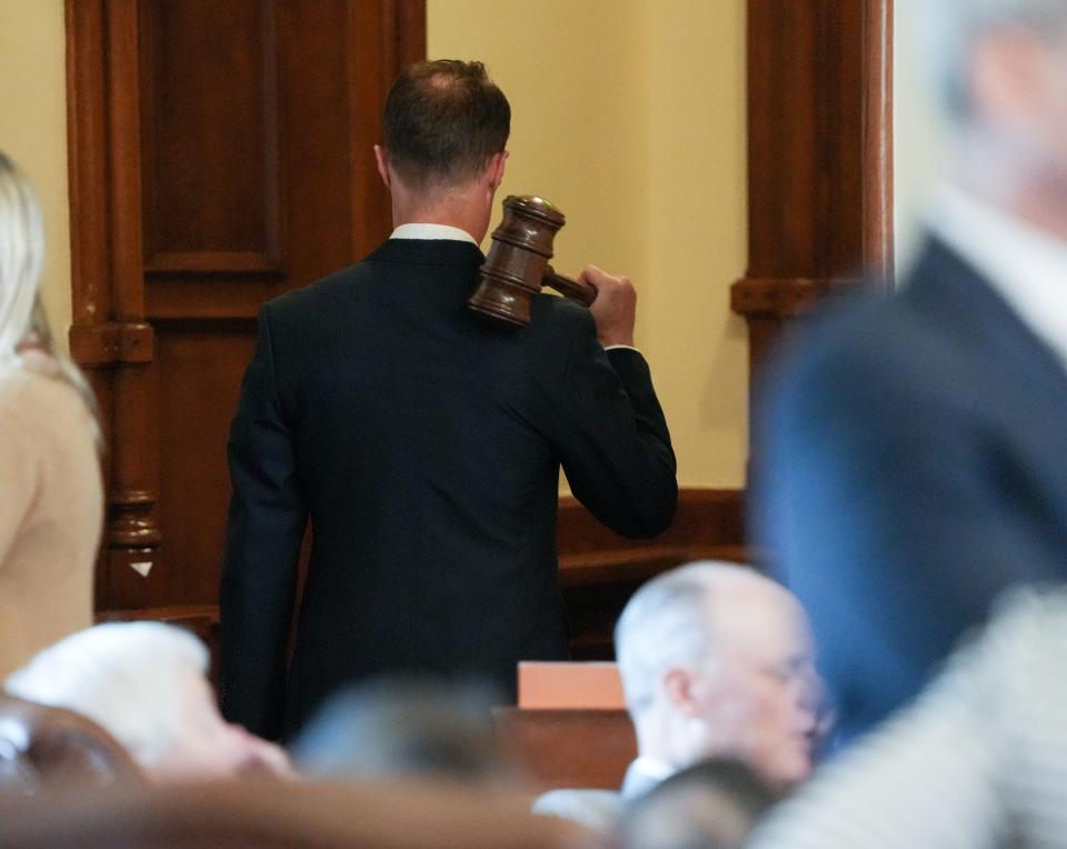 House Speaker Dade Phelan carries his gavel off the House floor Tuesday.