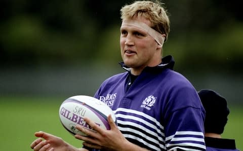 Doddie Weir holds rugby ball - Credit: GETTY IMAGES