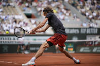 Germany's Alexander Zverev plays a shot against Argentina's Tomas Martin Etcheverry during their quarterfinal match of the French Open tennis tournament at the Roland Garros stadium in Paris, Wednesday, June 7, 2023. (AP Photo/Christophe Ena)