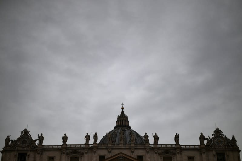 FILE PHOTO: The dome of Saint Peter's Basilica is seen on a rainy day in Saint Peter's Square at the Vatican