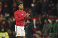 Manchester United's Marcus Rashford celebrates after the English League Cup quarter final soccer match between Manchester United and Charlton Athletic at Old Trafford in Manchester, England, Tuesday, Jan. 10, 2023. (AP Photo/Dave Thompson)