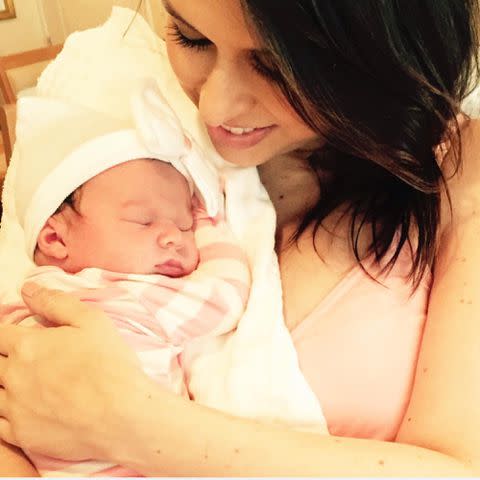 <p>Lacey Chabert Instagram</p> Lacey Chabert with her infant daughter Julia Mimi Bella Nehdar.