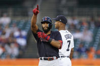 Cleveland Guardians' Amed Rosario celebrates his one-run double against the Detroit Tigers in the sixth inning of a baseball game in Detroit, Tuesday, Aug. 9, 2022. (AP Photo/Paul Sancya)