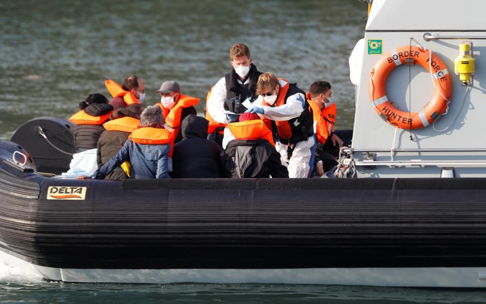 Several boats were intercepted by Border Force patrols and escorted to Dover for processing - Reuters