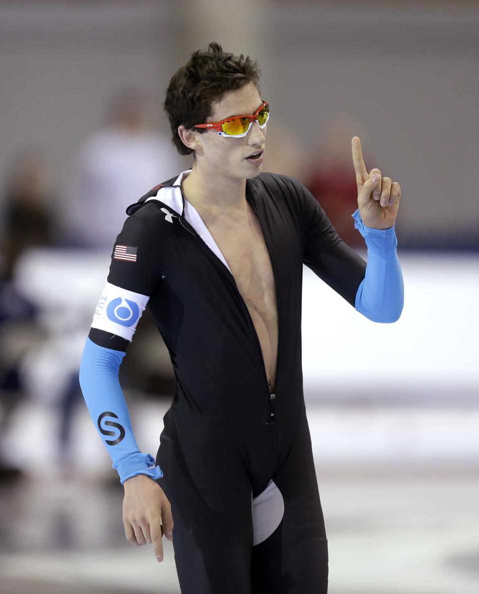 Emery Lehman celebrates after competing in the men's 10,000 meters during the U.S. Olympic speedskating trials Wednesday, Jan. 1, 2014, in Kearns, Utah. Lehman won the event. (AP Photo/Rick Bowmer)