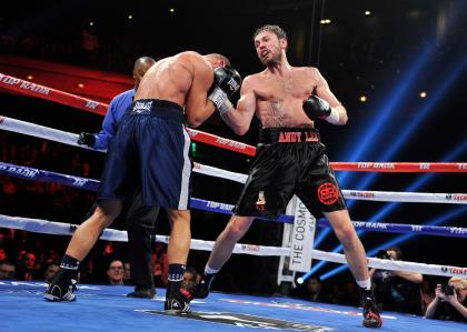 Andy Lee (R) throws a right at Matt Korobov during their fight. (Getty)