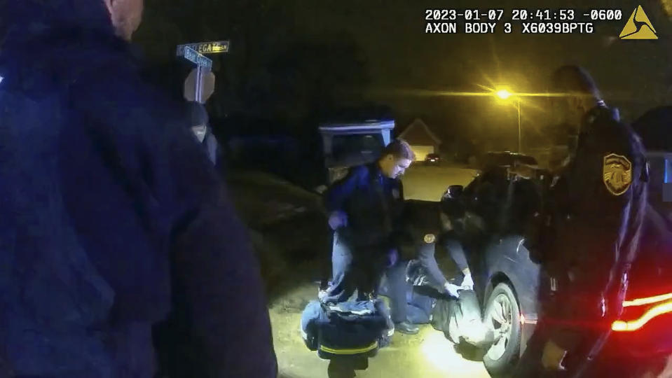 The image from video released on Jan. 27, 2023, by the City of Memphis, shows Tyre Nichols on the ground as medics arrive during a brutal attack by five Memphis police officers on Jan. 7, 2023, in Memphis, Tenn. Nichols died on Jan. 10. The five officers have since been fired and charged with second-degree murder and other offenses. (City of Memphis via AP)