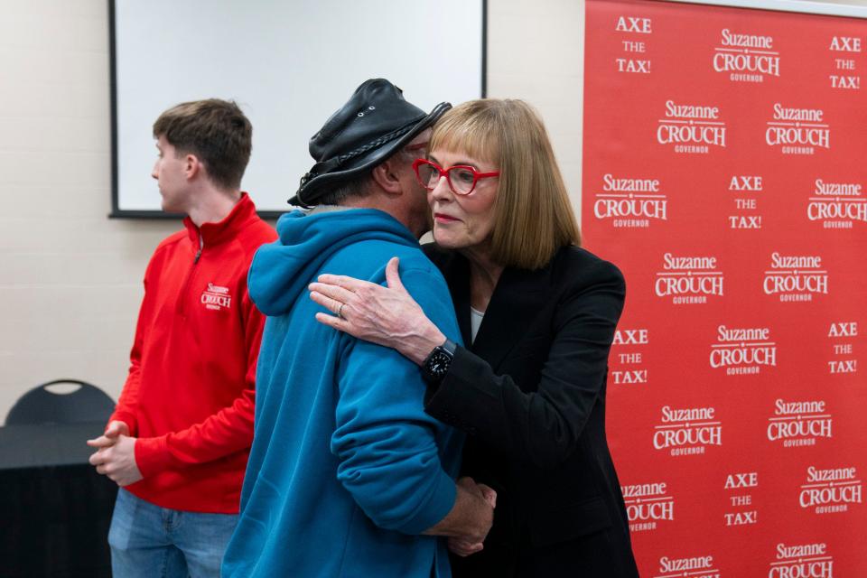 Lt. Gov. Suzanne Crouch, an Indiana Republican gubernatorial candidate, shakes hands with county councilor Kevin Van Horn, Thursday, April 4, 2024, during a listening session about the LEAP District at the Witham Pavilion at the Boone County Fairgrounds in Lebanon, Indiana.
