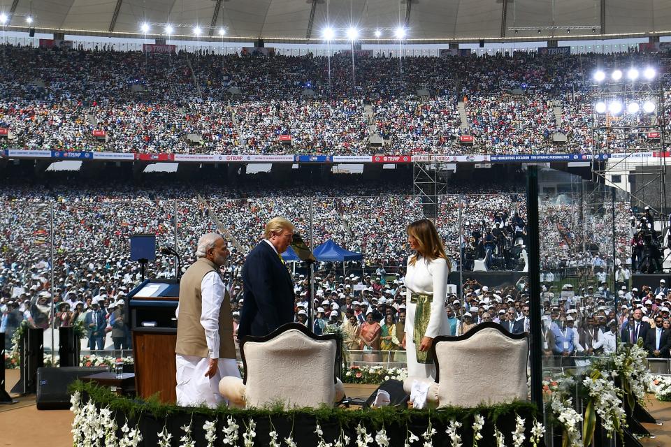 US President Donald Trump (C), First Lady Melania Trump (R) and India's Prime Minister Narendra Modi arrive to attend 'Namaste Trump' rally at Sardar Patel Stadium in Motera, on the outskirts of Ahmedabad, on February 24, 2020. (Photo by Mandel NGAN / AFP) (Photo by MANDEL NGAN/AFP via Getty Images)