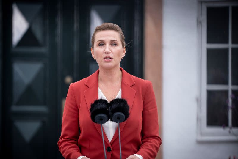 Denmark's Prime Minister Mette Frederiksen speaks during a news conference in front of Marienborg