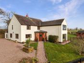 <p>This detached farmhouse is also a popular property, thanks to its sprawling land, characterful features and self-contained holiday cottage. It is countryside living at its finest. </p><p><a href="https://www.onthemarket.com/details/8505134/" rel="nofollow noopener" target="_blank" data-ylk="slk:This property is on the market for £995,000 via James Du Pavey Estate Agents at Onthemarket.com;elm:context_link;itc:0;sec:content-canvas" class="link ">This property is on the market for £995,000 via James Du Pavey Estate Agents at Onthemarket.com</a>. </p>