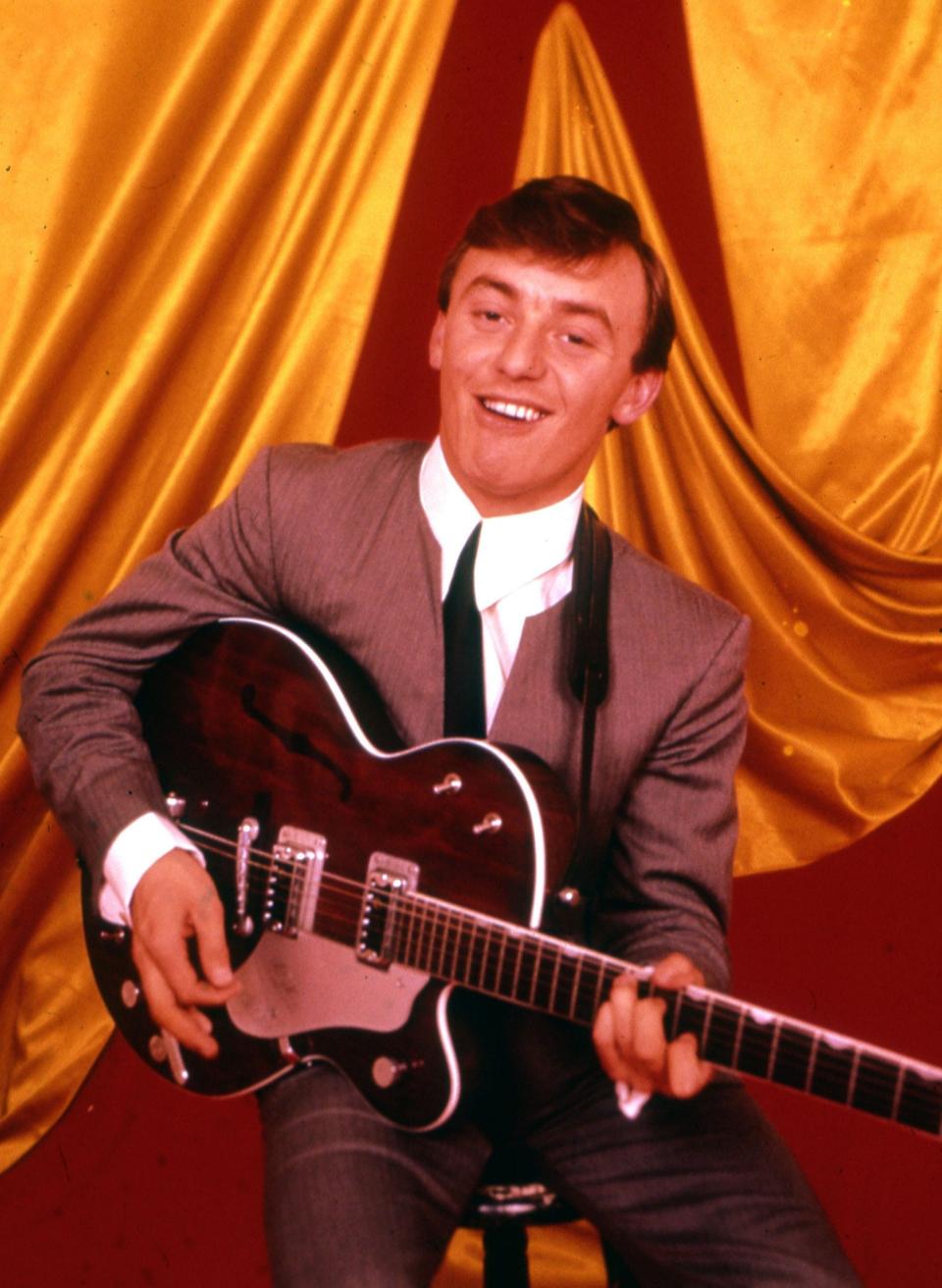 In 1963, the year he and the band topped the charts three times and toured the UK with Roy Orbison and the Beatles - Alamy