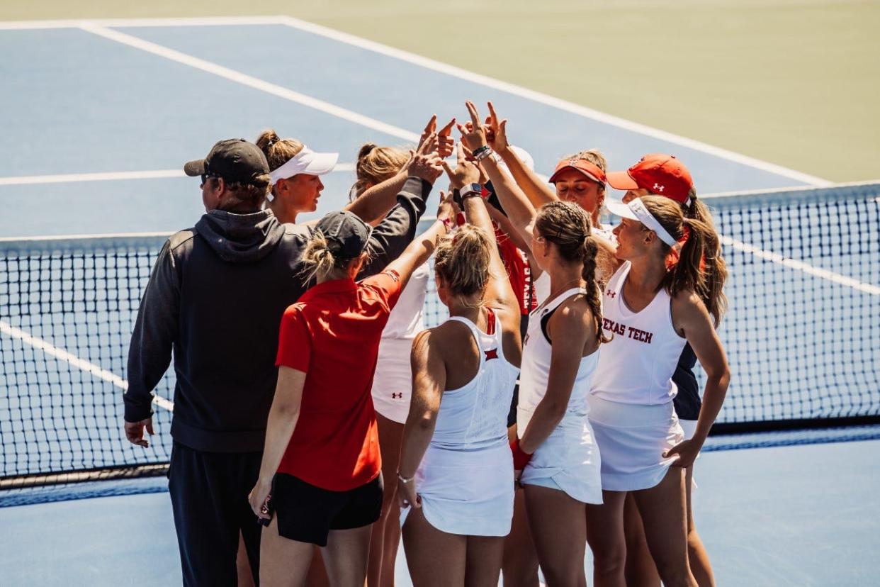 Members of the Texas Tech women's tennis team huddle up during an NCAA tournament second-round match Saturday against No. 11 California in Berkeley, California. The Golden Bears won 4-0 to advance to a super regional.