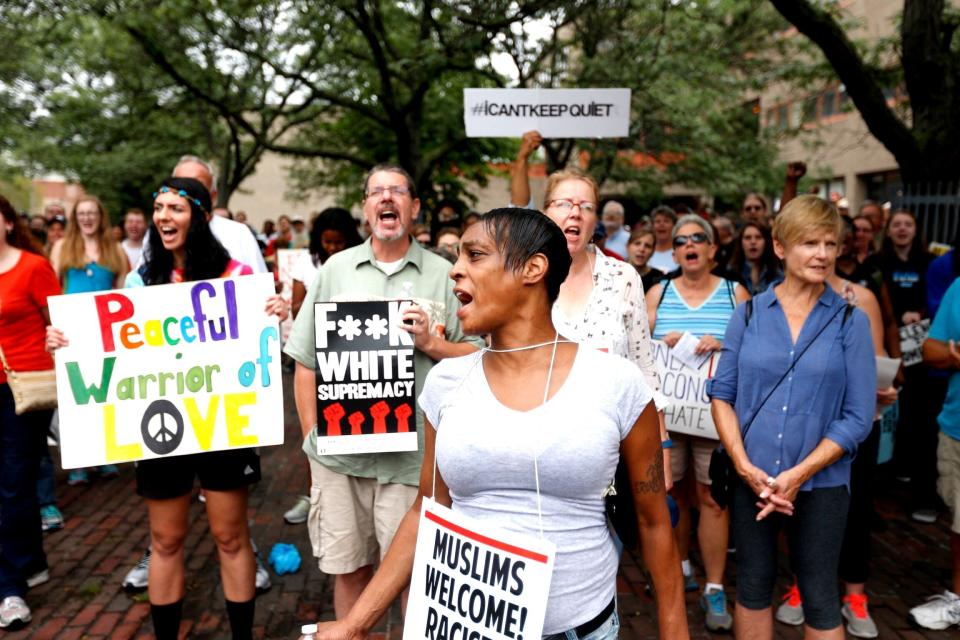 Counterprotesters gather in the Roxbury neighborhood of Boston before marching.