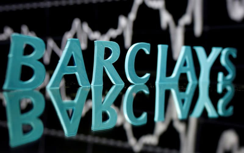 FILE PHOTO: FILE PHOTO: FILE PHOTO: The Barclays logo is seen in front of displayed stock graph in this illustration