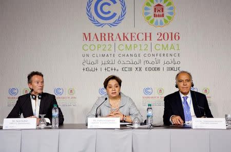 (L-R) UNFCCC Spokesperson Nick Nuttall, Executive Secretary of the UN Framework Convention on Climate Change Patricia Espinosa and Moroccan Foreign Minister and COP22 President Salaheddine Mezouar attend the World Climate Change Conference 2016 (COP22) in Marrakech, Morocco, November 6, 2016. REUTERS/Youssef Boudlal