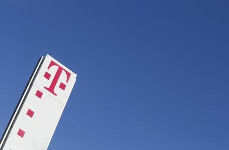 The logo of Deutsche Telekom AG stands in front of the company's headquarters in Bonn February 26, 2015. Reuters Photographer