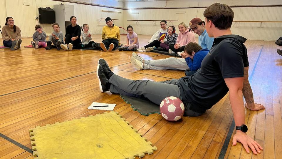 Alec Bélanger leads an Extra Awesome gathering on Sunday, Feb. 25, 2024.