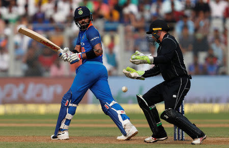 Cricket - India v New Zealand - First One Day International Match - Mumbai, India – October 22, 2017 – India's captain Virat Kohli plays a shot. REUTERS/Danish Siddiqui