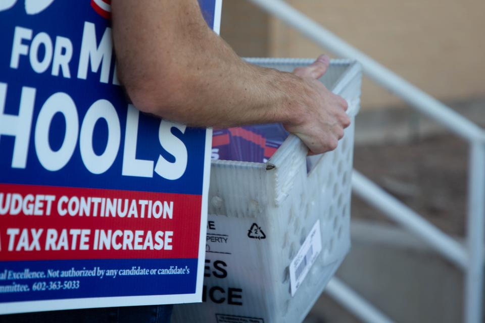 More than 18,000 postcards are delivered to the post office by advocates in Mesa on Oct. 10, 2023.