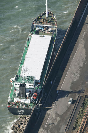 A cargo ship washed ashore by Typhoon Trami is seen in Kawasaki, Japan, in this photo taken by Kyodo October 1, 2018. Mandatory credit Kyodo/via REUTERS