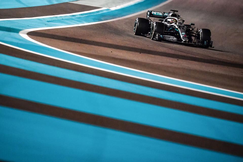 TOPSHOT - Mercedes' British driver Lewis Hamilton steers his car at the Yas Marina Circuit in Abu Dhabi, during the final race of the Formula One Grand Prix season, on December 1, 2019. -  (Photo by ANDREJ ISAKOVIC / AFP) (Photo by ANDREJ ISAKOVIC/AFP via Getty Images)