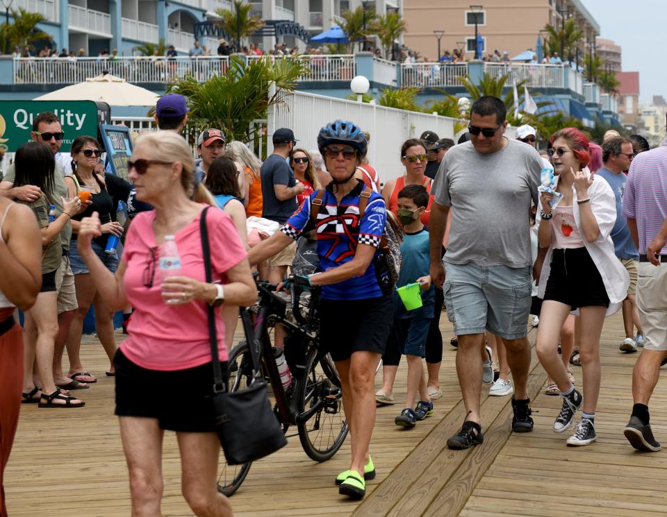 A crowd makes their way down the Ocean City Boardwalk on Saturday, June 11, 2022.