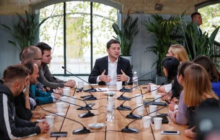 Ukraine's President Volodymyr Zelenskiy holds a press-marathon at a food market in Kiev