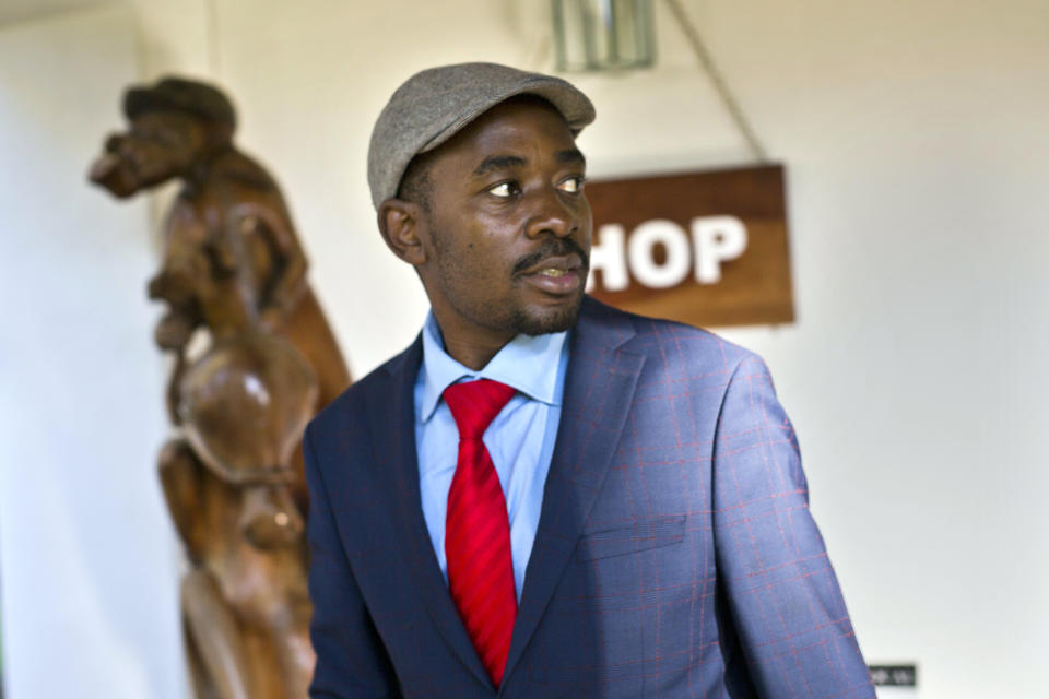 Opposition leader Nelson Chamisa leaves the Bronte hotel following his press conference in Harare, Zimbabwe, Friday Aug. 3, 2018. Hours after President Emmerson Mnangagwa was declared the winner of a tight election, riot police disrupted the press conference where opposition leader Nelson Chamisa was about to respond to the election results. (AP Photo/Jerome Delay)