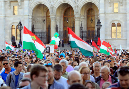 People attend a protest against the government of Prime Minister Viktor Orban in Budapest, Hungary, April 21, 2018. REUTERS/Bernadett Szabo