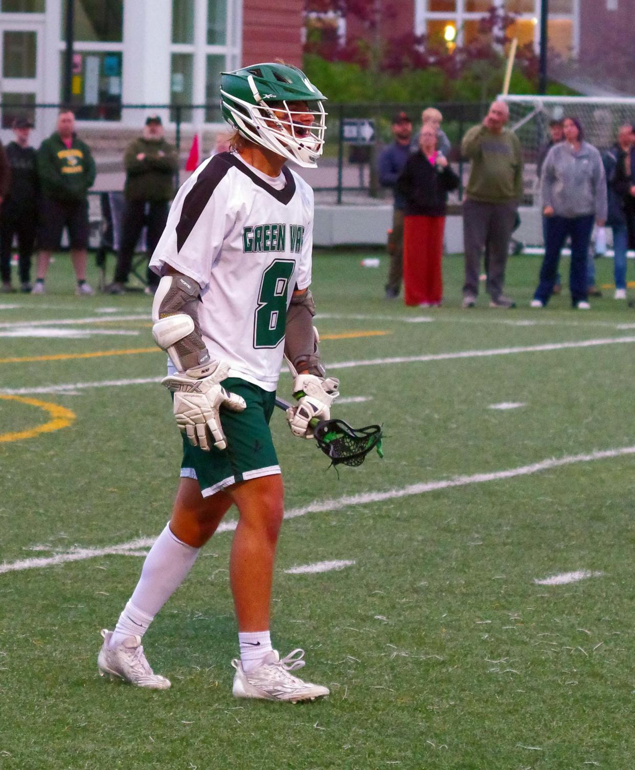 Hunter Grafton of Abington walks toward his teammates after scoring another goal in another multi goal game for the Green wave, who took a 17-4 victory over South Shore Tech to advance, on Monday, June 5, 2023.