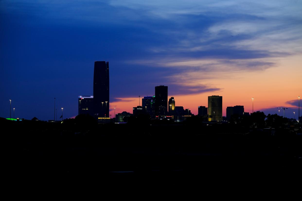 The sun sets on the downtown Oklahoma City skyline.