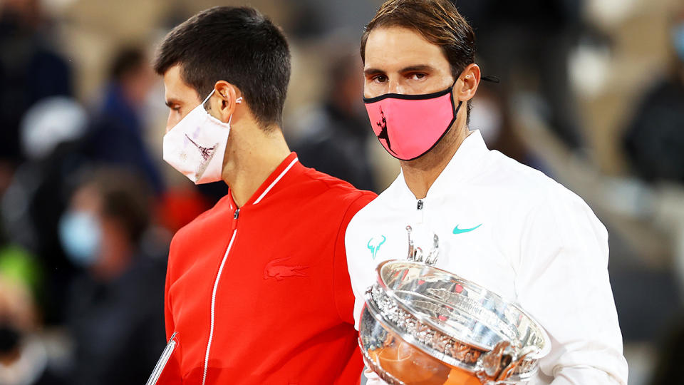 Rafael Nadal and Novak Djokovic are pictured after the French Open final in 2020.