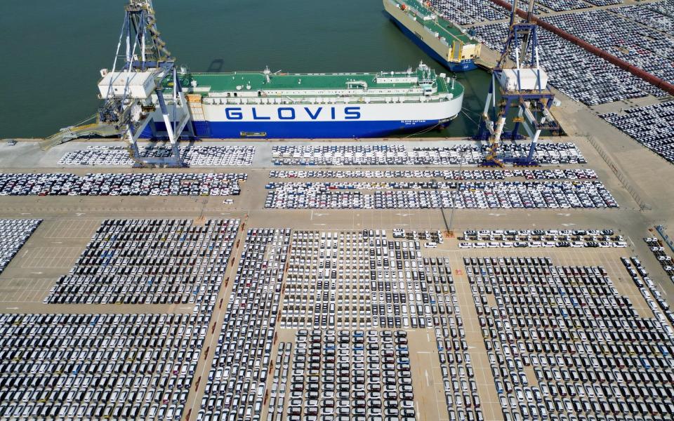 A large number of export vehicles are assembled at the port of Yantai to be shipped