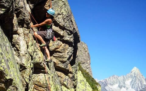 Megan Hine climbing in Kenya