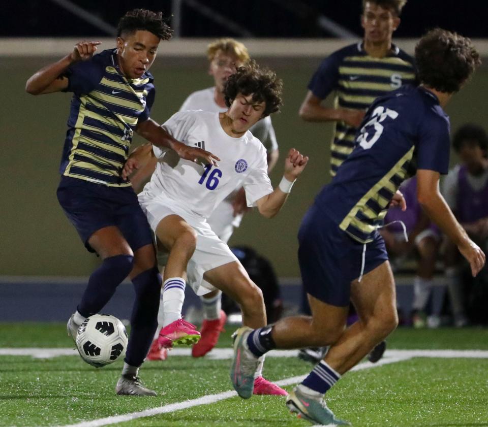 Salesianum's Aiden Gonzalez (left) and Charter of Wilmington's Michael Capretto converge in the first half of the Sals' 2-0 win at Abessinio Stadium on Sept. 19. Both players were ranked among Delaware's best by the state's coaches this season.