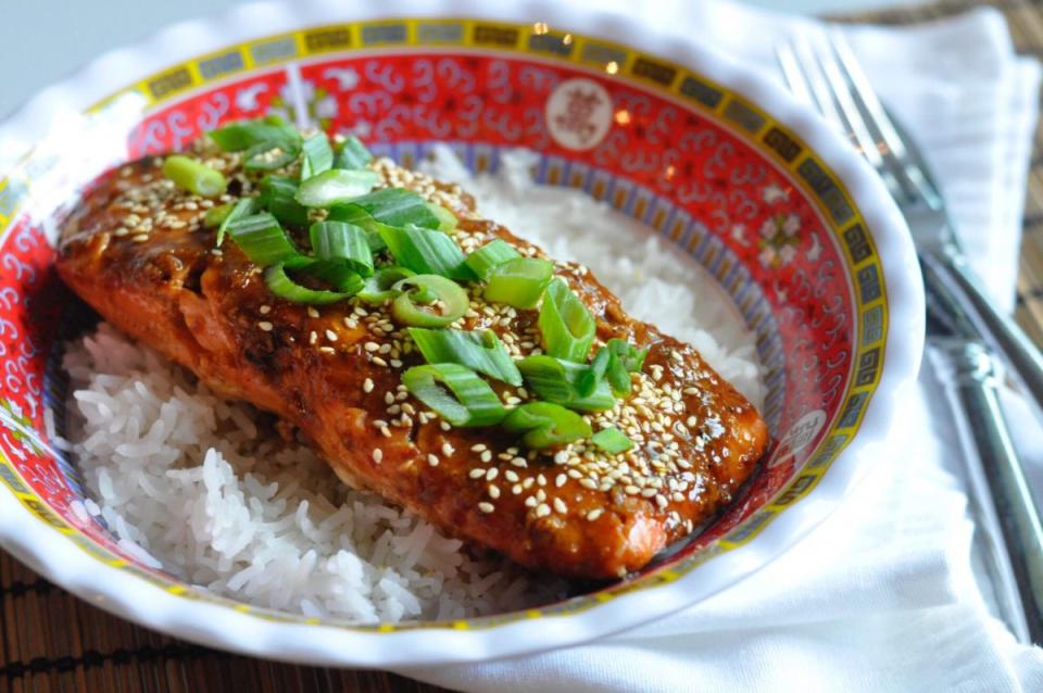 <p>Couple In The Kitchen</p><p>This full-flavor salmon dish can be prepared with the sous-vide method, or traditional stove-top.</p><p><strong>Get the recipe: <a href="https://coupleinthekitchen.com/sriracha-honey-salmon" rel="nofollow noopener" target="_blank" data-ylk="slk:Hot Honey and Sriracha Salmon;elm:context_link;itc:0;sec:content-canvas" class="link ">Hot Honey and Sriracha Salmon</a></strong></p>